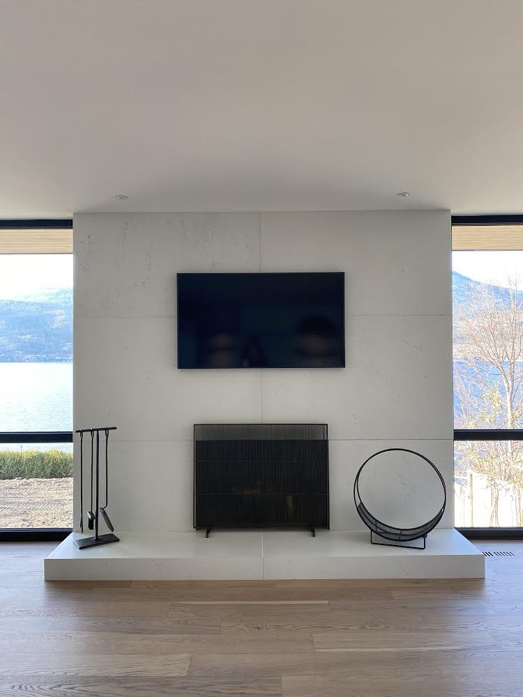 Finished fireplace with lake views